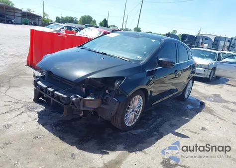 2014 Ford Focus Titanium из США, поврежденный, VIN 1FADP3N21EL429653